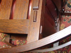 Close-up of thru-tenon joinery at back leg and steam bent rocker.
